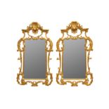 A PAIR OF VICTORIAN STYLE CARVED GILT-WOOD MIRRORS