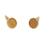 A PAIR OF 18K GOLD MOUNTED 1/4 SOVEREIGN CUFFLINKS