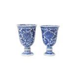 A NEAR-PAIR OF CHINESE BLUE AND WHITE GOBLETS 清康熙 青花蓮紋盃兩件