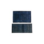 TWO CHINESE DARK BLUE CARPETS 十九或二十世紀 深藍底花卉紋地毯兩件