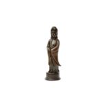 A CHINESE BRONZE FIGURE OF GUANYIN 晚清 銅觀音立像