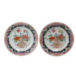 A PAIR OF FAMILLE-ROSE 'FLOWER BASKET' DISHES 清雍正 粉彩繪花籃紋碟一對