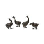 A GROUP OF FOUR JAPANESE BRONZE OKIMONO OF GEESE