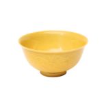 A CHINESE YELLOW-GLAZED INCISED 'DRAGON' BOWL 清乾隆 黃地暗刻龍紋盌 《大清乾隆年製》款