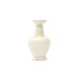 A CHINESE WHITE-GLAZED SMALL VASE 宋或元 白釉撇口小瓶