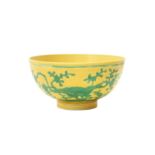 A CHINESE YELLOW-GROUND 'BIRDS AND PEACHES' BOWL 清光緒 黃地綠彩桃樹花鳥紋盌 《大清光緒年製》