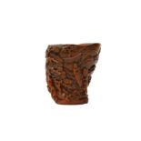 A CHINESE CARVED BOXWOOD 'SCHOLARS AND BOYS' LIBATION CUP 十七或十八世紀 黃楊木雕高士童子圖盃