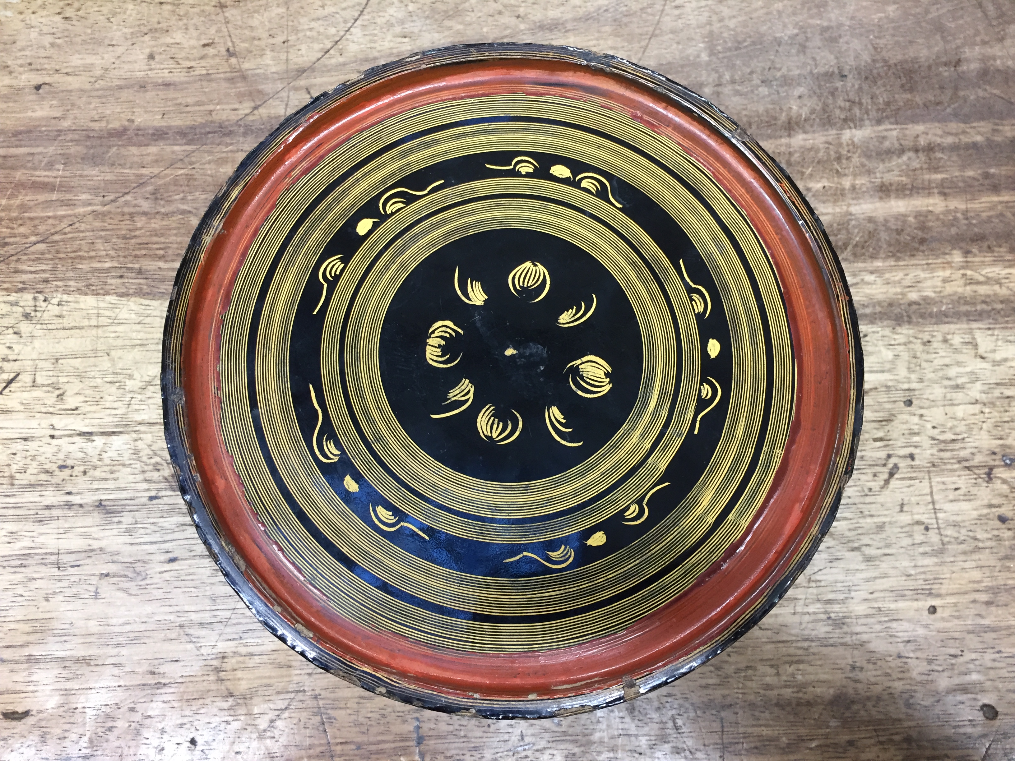 A BURMESE RED AND BLACK LACQUER 'MYTHICAL CREATURE' BETEL-BOX AND COVER OFFERED ON BEHALF OF - Image 13 of 23