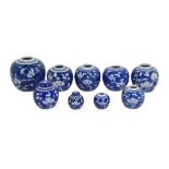 A COLLECTION OF CHINESE PORCELAIN PRUNUS BLOSSOM DECORATED GINGER JARS