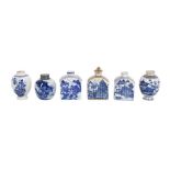A GROUP OF CHINESE QING DYNASTY BLUE AND WHITE PORCELAIN VASES AND TEA CANISTERS