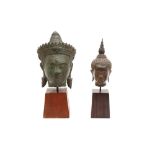 TWO SOUTH EAST ASIAN BUDDHA HEADS