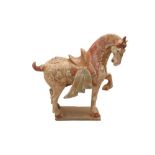 A CHINESE TANG-STYLE POTTERY HORSE, 20TH CENTURY