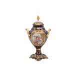 A 20TH CENTURY SEVRES STYLE URN AND COVER
