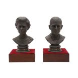 A PAIR OF ROYAL DOULTON BASALT BUSTS OF H.M. QUEEN ELIZABETH II AND PRINCE PHILLIP