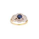 A SAPPHIRE AND DIAMOND RING