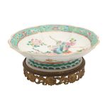 A CHINESE FAMILLE-ROSE FOOTED DISH, 19TH CENTURY
