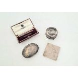 An Edwardian sterling silver squeeze action tobacco box, Birmingham 1906 by Williams Ltd