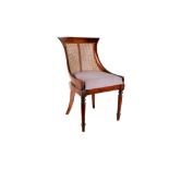 A REGENCY PERIOD SIMULATED ROSEWOOD CANED TUB CHAIR