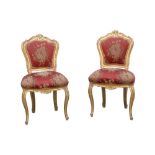 A PAIR OF LOUIS XV STYLE CARVED GILTWOOD AND GESSO SIDE CHAIRS