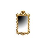 A GEORGE II GILTWOOD MIRROR