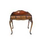 A QUEEN ANNE STYLE WALNUT WRITING TABLE