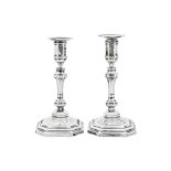 A pair of Edwardian sterling silver candlesticks, London 1901 by Thomas Bradbury