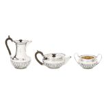 An assembled Victorian sterling silver three-piece tea and coffee service, partly London 1881 by Haw