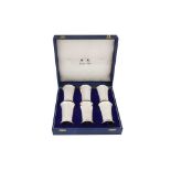 A cased set of six Elizabeth II sterling silver beakers, Sheffield 1962 by Mappin and Webb