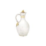 A Victorian parcel gilt sterling silver claret jug, London 1866 by George Fox