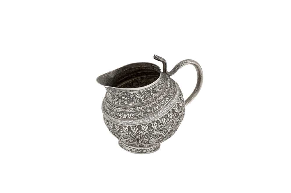 A late 19th / early 20th century Anglo - Indian unmarked silver three-piece tea service, Kashmir cir - Image 4 of 8