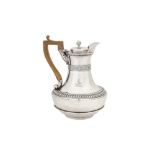 A George III sterling silver hot water pot, London 1807 by Thomas and Joseph Guest and Joseph Craddo