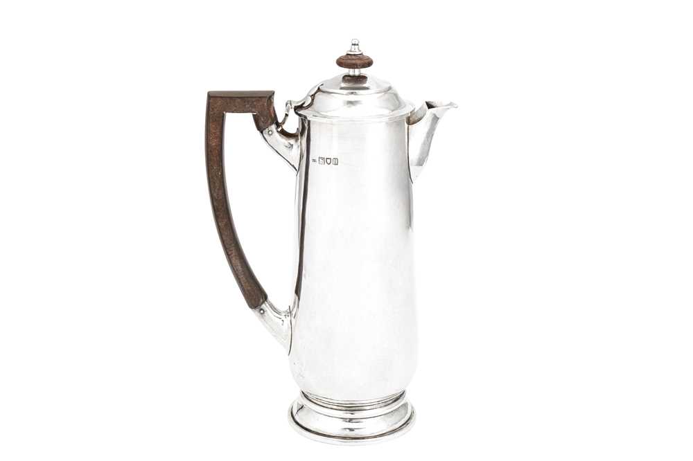 A George V 'Arts and Crafts' sterling silver hot water or coffee pot, London 1915 by Charles John Pl