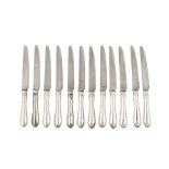 A set of twelve Elizabeth II sterling silver table knives, Sheffield 1973 by DJS