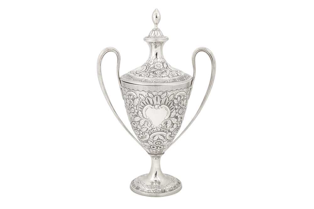 A George III sterling silver twin handled cup and cover, London 1790 by Thomas Howell of Bath (proba