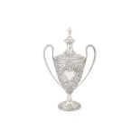 A George III sterling silver twin handled cup and cover, London 1790 by Thomas Howell of Bath (proba