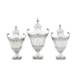 A set of three George III sterling silver condiment and sugar vases, London 1776 by Pierre or Peter