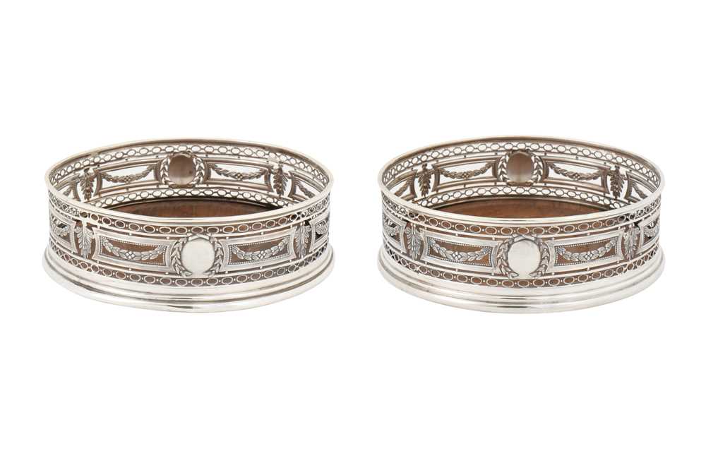 A pair of late 19th century French 950 standard silver wine coasters, Paris circa 1890 by Alfred Hec