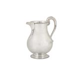 A George VI sterling silver water jug or ewer, London 1951 by Israel Freeman and Son Ltd