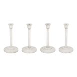 A set of four Elizabeth II contemporary sterling silver candlesticks, London 2002 by Theo Fennell