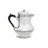 A George IV sterling silver hot water jug, London 1825 by Richard Atkins and William Somersall overs