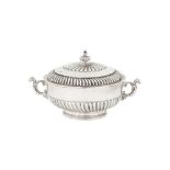 A George V Britannia standard silver covered twin handled sugar bowl, London 1911 by Lionel Alfred C