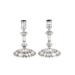 A pair of George II sterling silver cast candlesticks, London 1743 by Thomas Gilpin (reg. 24th Sep 1