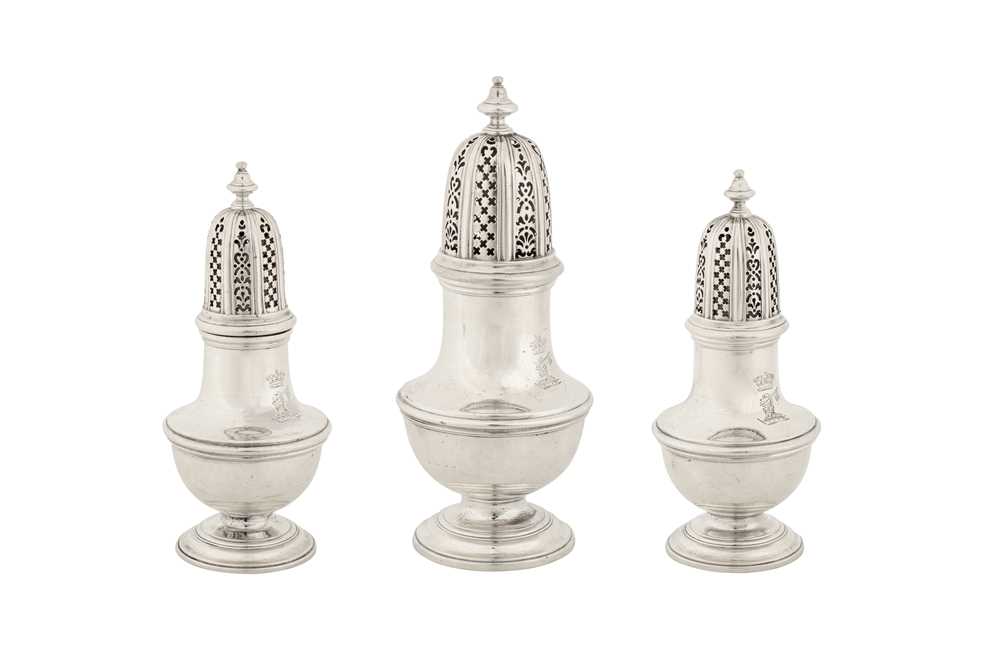 A graduated set of three mid-18th century unmarked silver casters, possibly West Indian c - Image 2 of 6