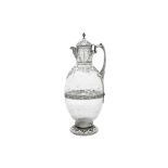 A Victorian sterling silver mounted cut glass claret jug, London 1893 by Charles Evans