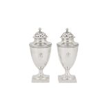 A pair of George III sterling silver pepper casters, London 1795 by Robert and David Hennell II (reg