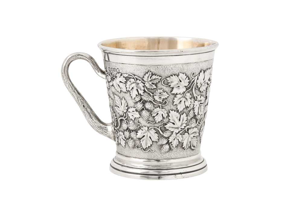 A Victorian sterling silver ‘fruiting vine’ mug, London 1887 by Robert Roskell, Alan Roskell and Joh