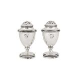 A pair of George III sterling silver pepper casters, London 1809 by Rebecca Emes and Edward Barnard