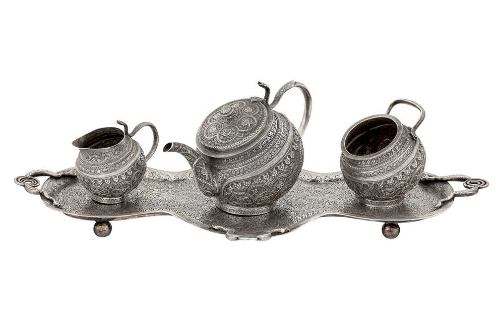 A late 19th / early 20th century Anglo - Indian unmarked silver three-piece tea service, Kashmir cir - Image 8 of 8