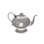 An early 20th century Anglo – Indian unmarked silver teapot, Cutch circa 1910