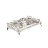 A large Victorian sterling silver inkstand, London 1894/96/99 by Thomas Bradbury and Sons